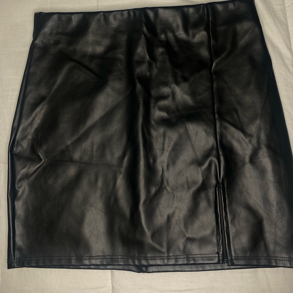 Black leather skirt with slit